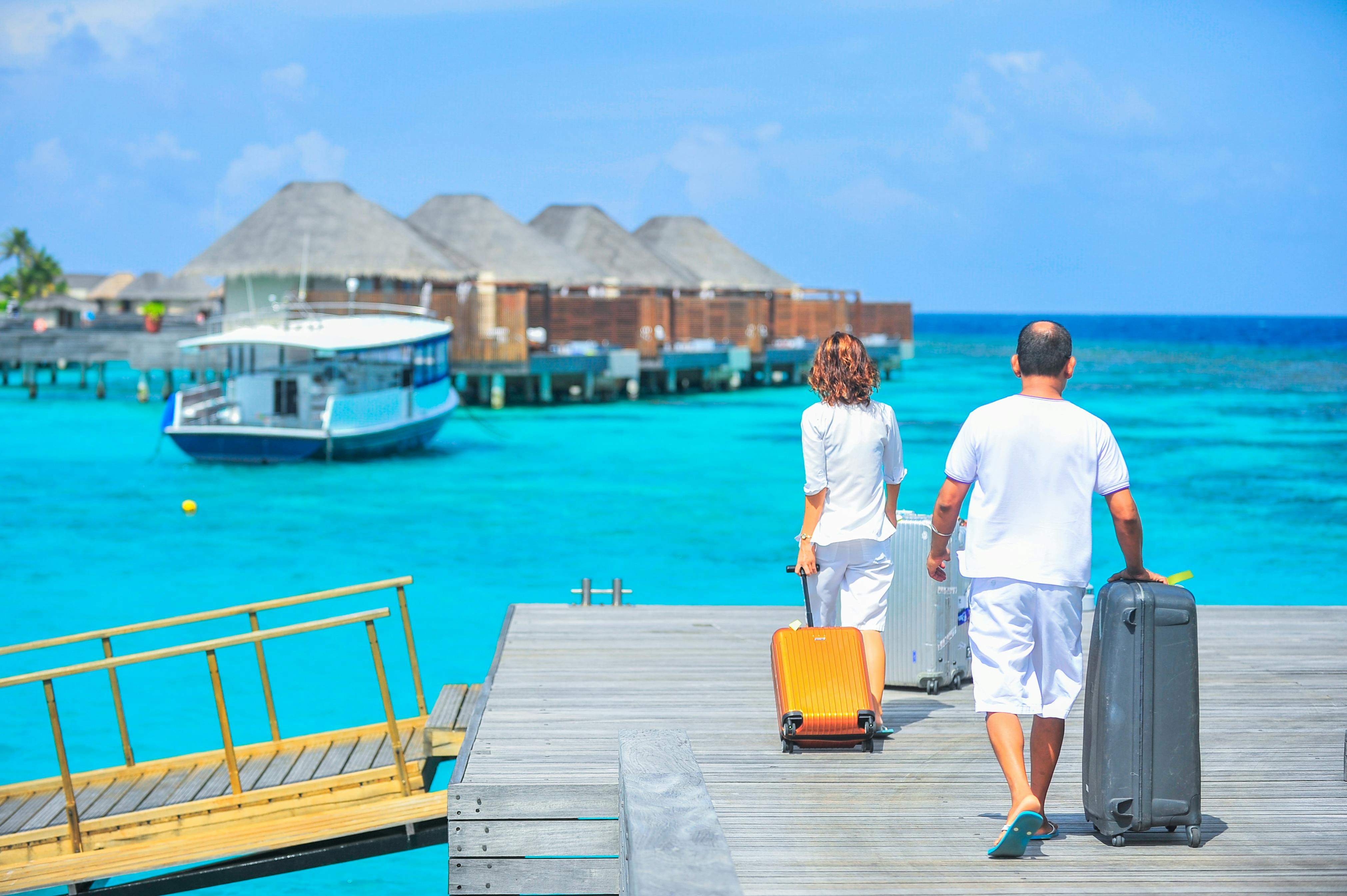 Tropical island paradise with clear turquoise water and white sand beach